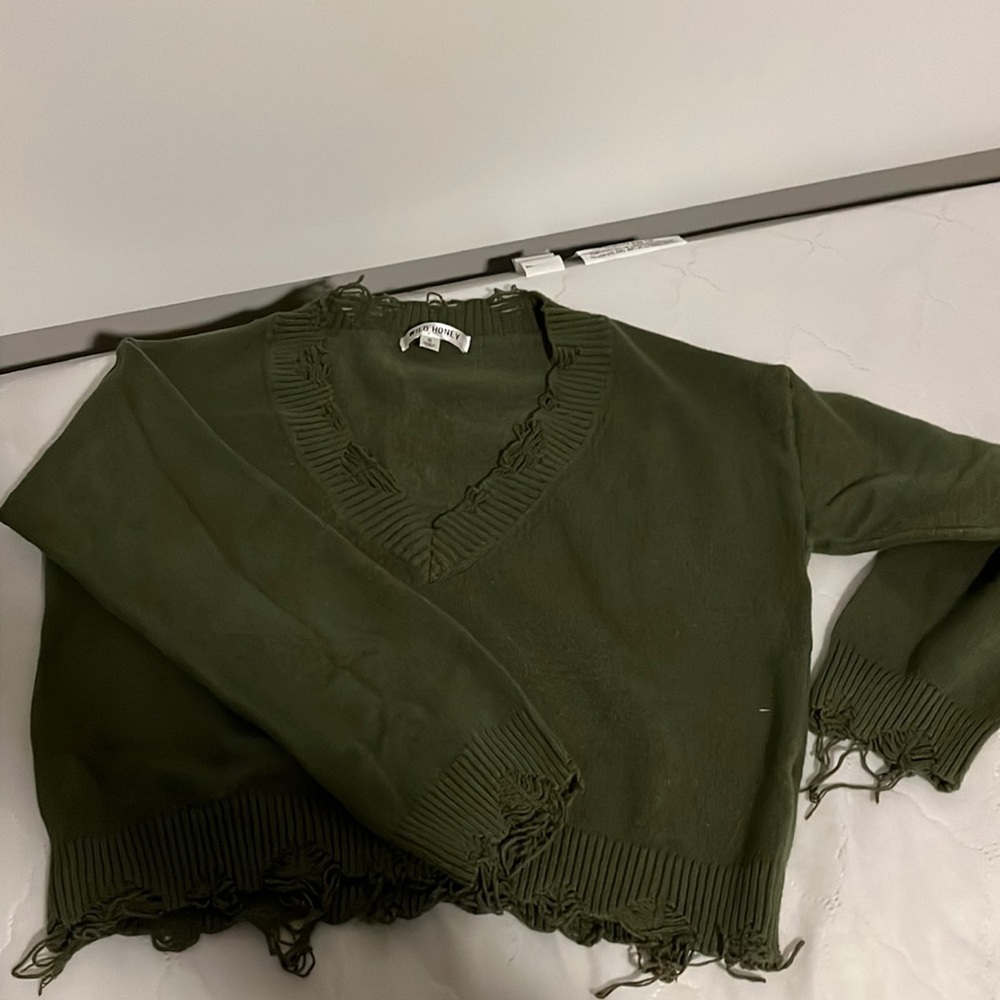 Distressed cropped sweater